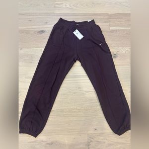 Burgundy Nike loose fit mid rose sweatpants
